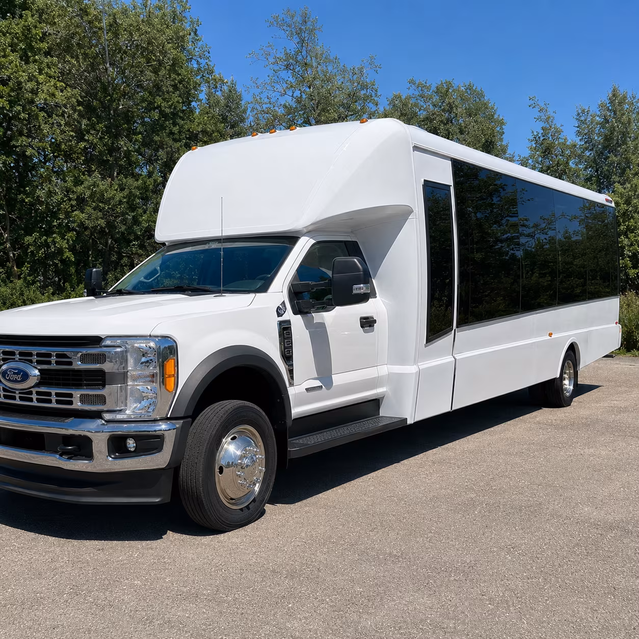 corporate airport transfer buses at bill and hillary clinton national airport lit