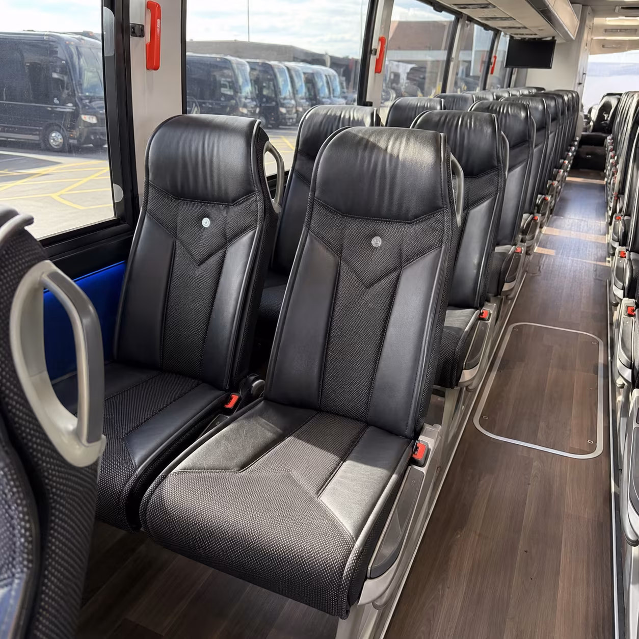 little rock 56 passenger charter bus inside